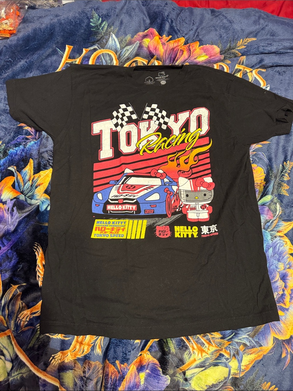 Hello Kitty Black Tokyo Racing Graphic Tee with Red, Yellow & Blue Accents
